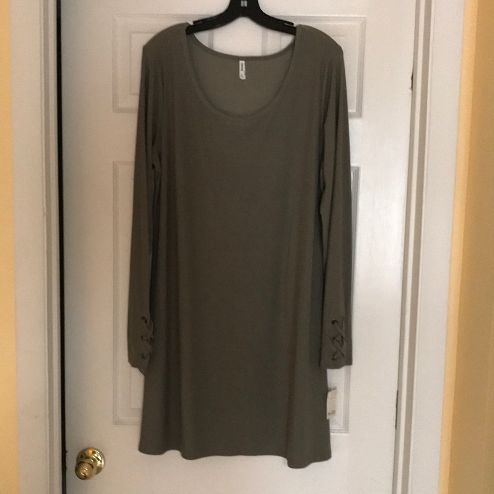 Olive color long sleeve dress.